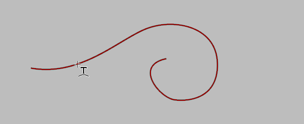 A curved path, outlined in red, with a cursor over it. The cursor shape has changed to a "T" standing on a curve.